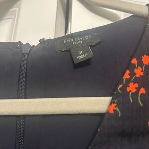 Ann Taylor size 2 petite dress. Navy blue with orange floral design.